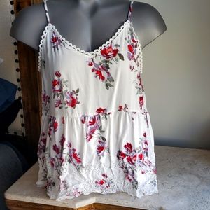 Maurices peplum tank. Size large. White floral.